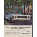 1961 Oldsmobile Ad "Beauty ... Economy"